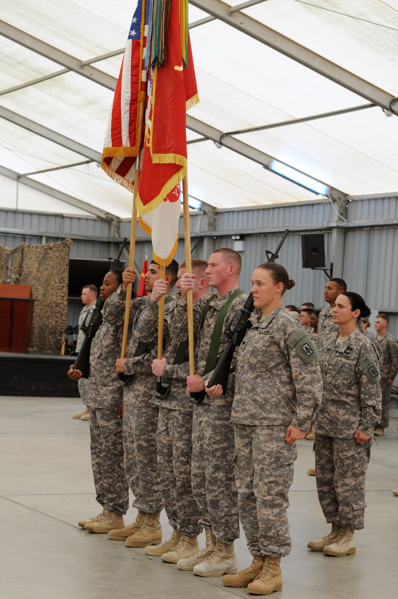 SOUTHWEST ASIA - The U.S. Army 1st Battalion, 7th Air Defense Artillery Regiment Color Guard stands at attention during their patching ceremony at the 380th Air Expeditionary Wing June 14, 2012. The unit, deployed from Ft. Bragg N.C., conducted its patching ceremony in conjunction with the U.S. Army's 237th birthday.  (U.S. Air Force photo/Master Sgt. Scott MacKay)