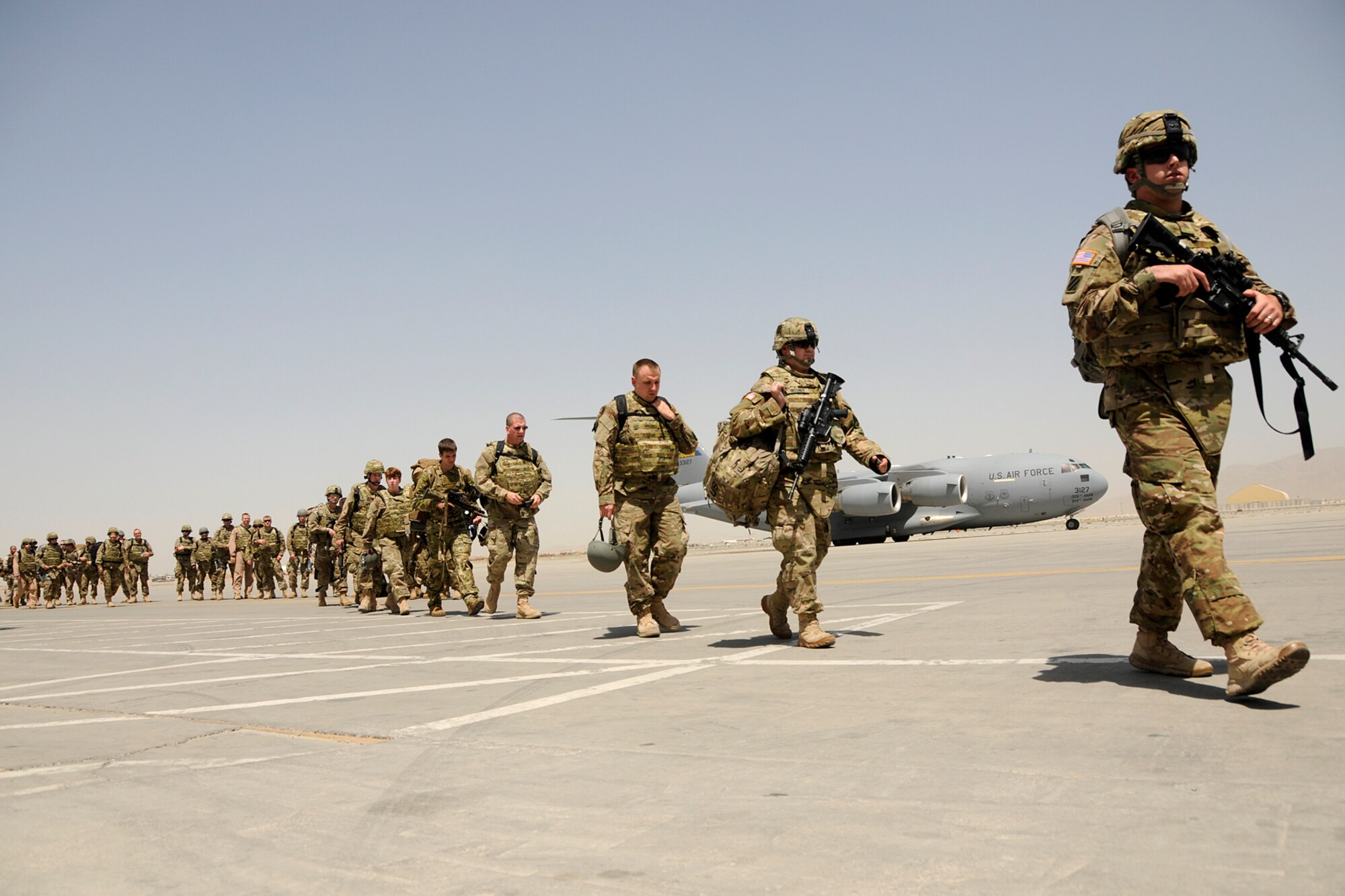 Personnel from McEntire Joint National Guard Base, S.C., arrive at Kandahar Airfield, Afghanistan, June 10, 2012, to begin the second half of the unit's Air Expeditionary Force rotation in country. Members of the 169th Fighter Wing are deployed in support of Operation Enduring Freedom. Swamp Fox F-16's, pilots, and support personnel began their AEF deployment early April to take over flying missions for the air tasking order and provide close air support for troops on the ground in Afghanistan.
(U.S. Air Force photo/TSgt. Caycee Cook)
