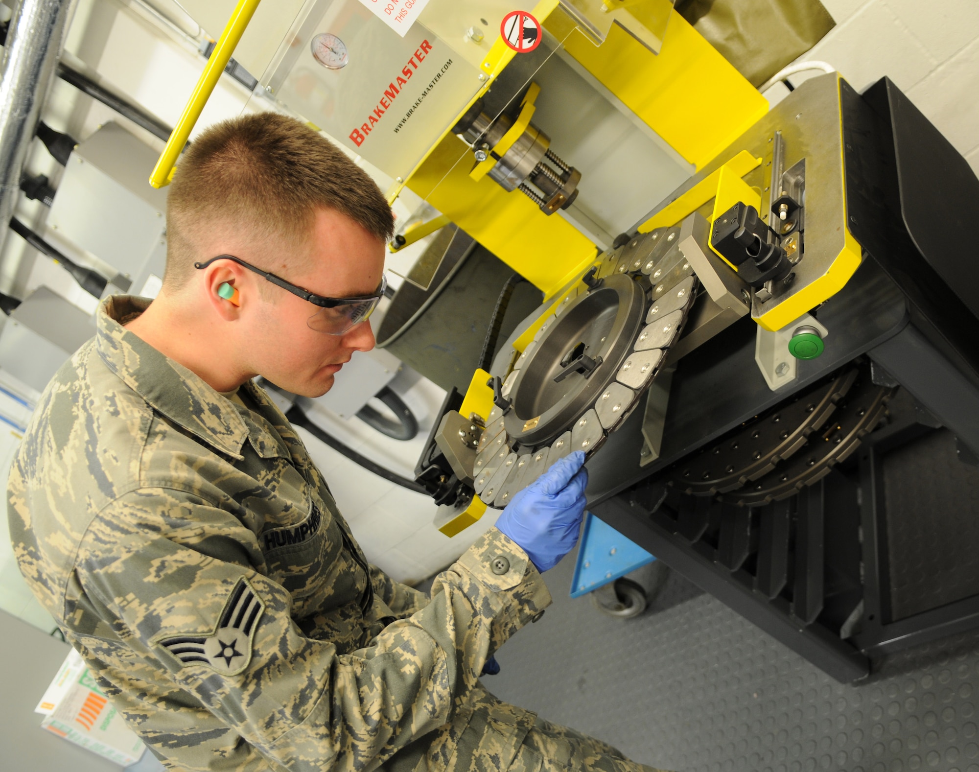 RAF MILDENHALL, England – Senior Airman Ethan Humphries, 100th Maintenance Squadron aircraft hydraulics journeyman, examines rivets on  a stator attachments to brake after using the BrakeMaster Aircraft Brake Servicing Press, June 12, 2012, at the hydraulics shop. The Airmen in the hydraulics shop service all KC-135 Stratotankers and 352nd Special Operations Group aircraft station here. (U.S. Air Force photo/Senior Airman Rachel Waller)  