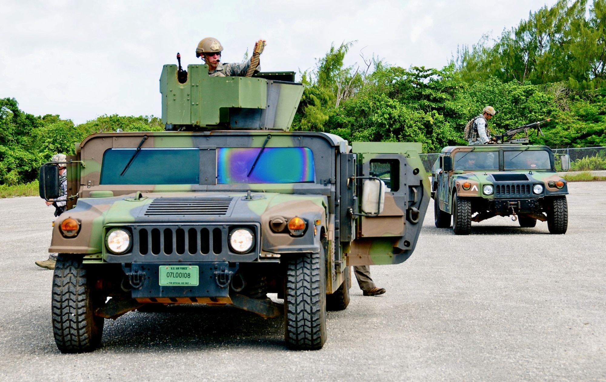 The 736th Security Forces Squadron Airmen prepare their high mobility multipurpose wheeled vehicle for a patrol during an exercise at Northwest field, Guam, June 6. The 36 CRG conducted a four-day exercise in order to hone their tactical skills, improve operational readiness and prepare for an upcoming unit compliance inspection. (U.S. Air Force photo by Airman 1st Class Marianique Santos/Released)