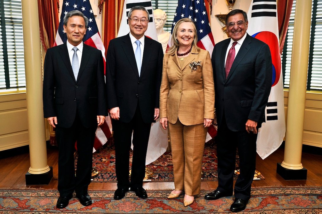 South Korean Defense Minister Kim Kwan-jin, far left, South Korean Foreign Affairs and Trade Minister Kim Sung-hwan, center left, U.S. Secretary of State Hillary Rodham Clinton, center right, and U.S. Defense Secretary Leon E. Panetta pose for an official photograph before they begin "Two-Plus-Two" talks at the State Department in Washington, D.C., June 14, 2012.