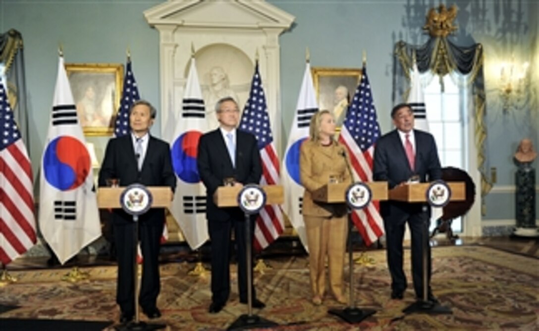 From left, South Korean Minister of Defense Kim Kwan-jin, South Korean Minister of Foreign Affairs and Trade Kim Sung Hwan, Secretary of State Hillary R. Clinton and Secretary of Defense Leon E. Panetta conduct a joint press conference in the Jefferson Room at the U.S. Department of State in Washington, D.C., on June 14, 2012.  