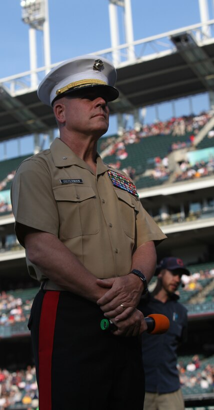 Brig. Gen. Joseph L. Osterman, the commanding general of Marine Corps Recruiting Command, prepares to lead soon-to-be Marine recruits in the oath of enlistment during Marine Night before the Cleveland Indians took on the Pittsburgh Pirates at Progressive Field June 15, during Marine Week Cleveland, which ends June 17. After the oath, the Marine Corps Base Quantico Band played v‚˜America the Beautiful,v‚
