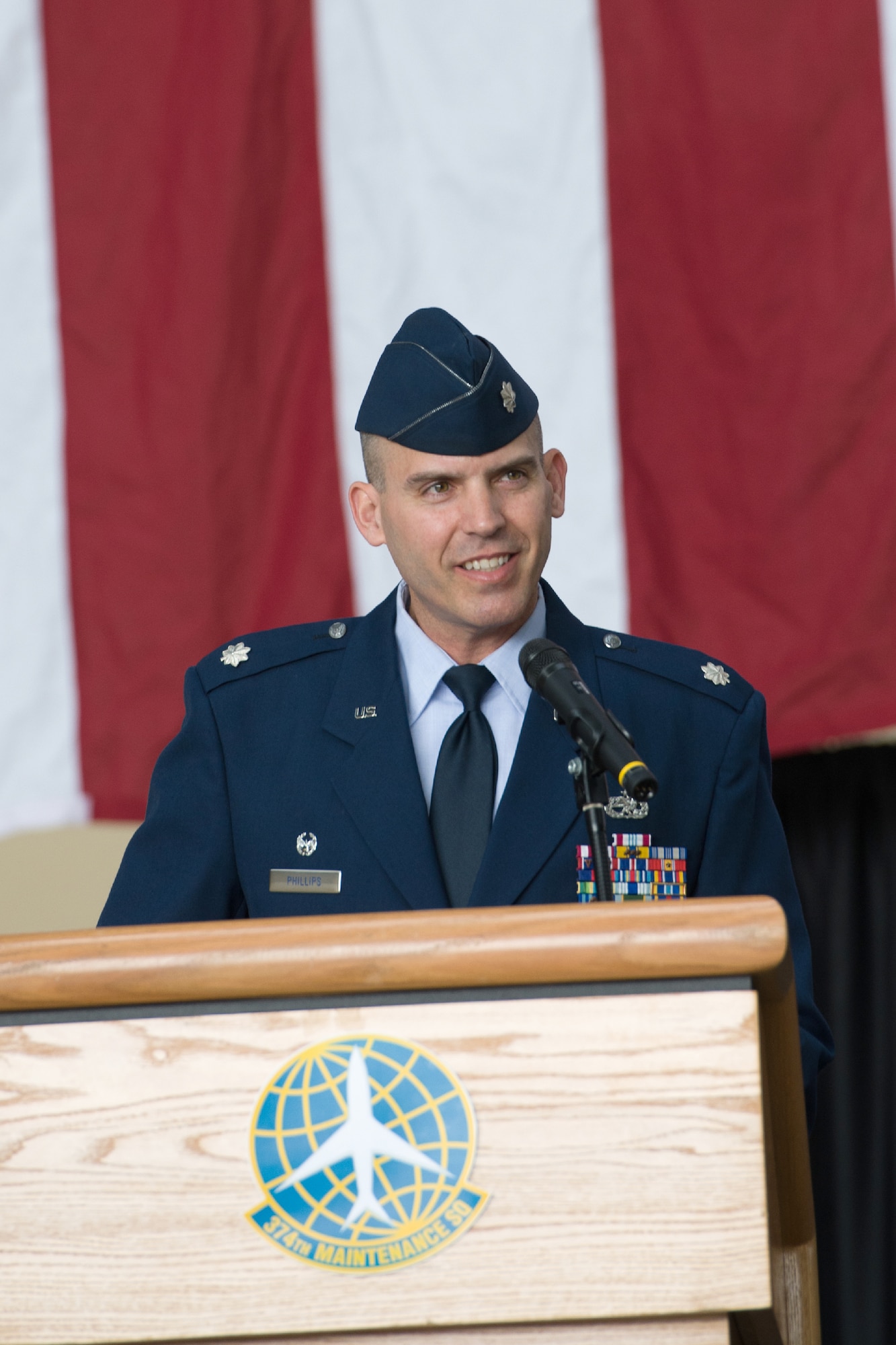 YOKOTA AIR BASE, Japan -- Lt. Col. William Phillips, 374th Maintenance Squadron commander, gives a speech during the 374th MXS change of command ceremony at Yokota Air Base, Japan, on June  15, 2012. Phillips was the Chief of Logistics for the 13th Air Force, Detachment 1 at Yokota Air Base, Japan. (U.S. Air Force photo by Osakabe Yasuo)