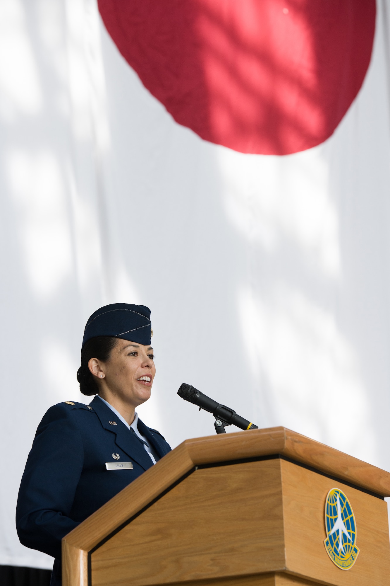 YOKOTA AIR BASE, Japan -- Maj. Katherine Lilly, 374th Maintenance Squadron commander, gives a speech during the 374th MXS change of command ceremony at Yokota Air Base, Japan, on June 15, 2012. The change of command is a traditional military ceremony in which the departing commander assembles their personnel for presentation to the incoming commander. (U.S. Air Force photo by Osakabe Yasuo)