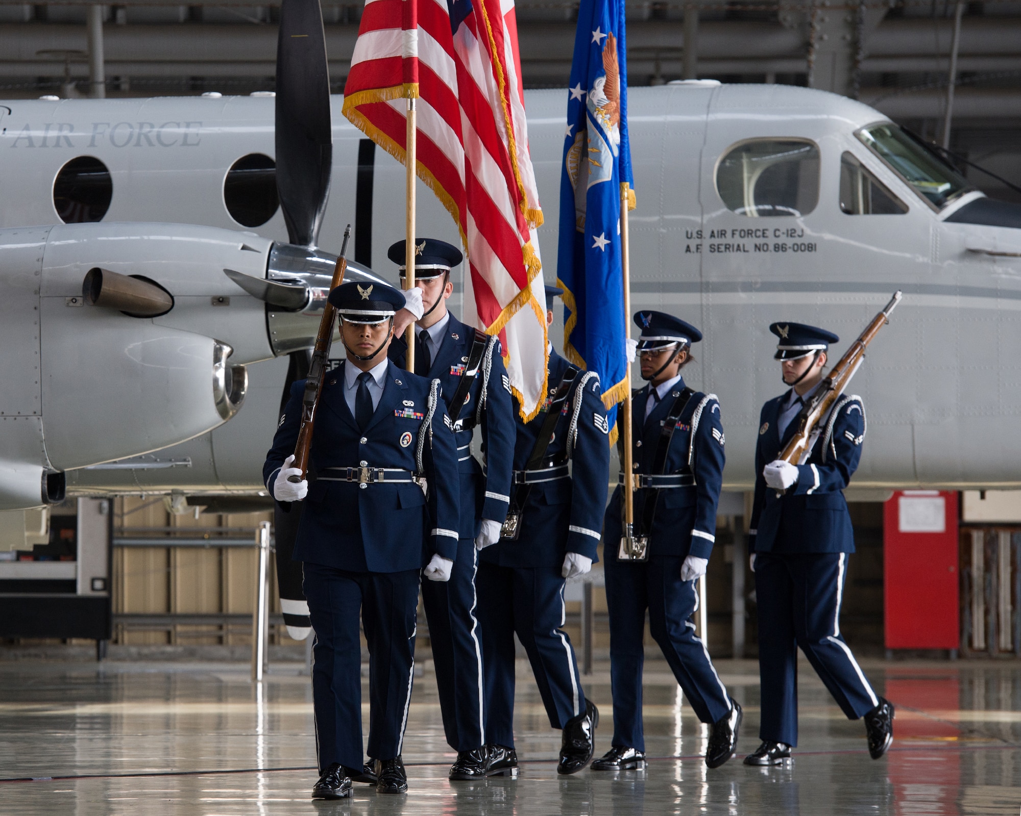 YOKOTA AIR BASE, Japan -- Yokota Honor Guard members post the colors during the 374th Maintenance Squadron change of command ceremony at Yokota Air Base, Japan, on June 15, 2012. The Honor Guard performs various military ceremonial traditions throughout the year. (U.S. Air Force photo by Osakabe Yasuo)