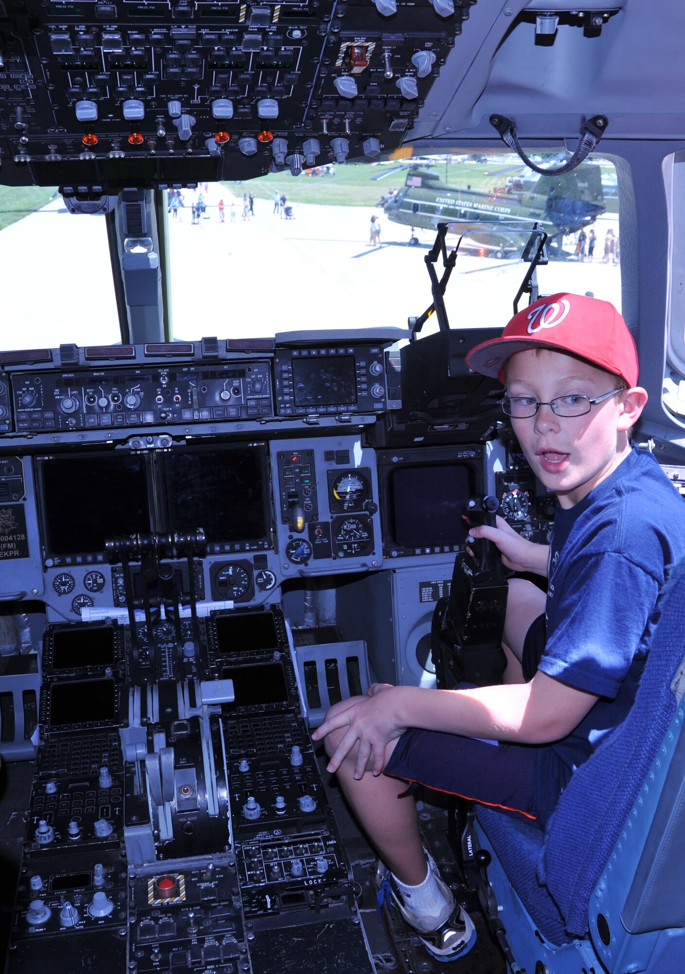 Nicholas Kendall, 10, is astonished about the controls of a C-17 Globemaster at "Become a Pilot Day" near Chantilly, Va., June 16, 2012. Become a Pilot Day is an annual event at the National Air and Space Museum, intended to introduce children to careers in aviation. (U.S. Air Force photo/Airman 1st Class Alexander W. Riedel)