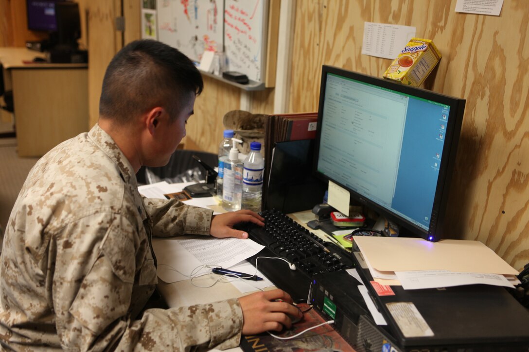 Petty Officer 3rd Class, William Poon, personnel specialist, G-1, Headquarters & Services Company, 1st Marine Logistics Group (Forward), works administration support for sailors in 1st MLG (Fwd) at Camp Leatherneck, Afghanistan. Despite the thousands of service members within the group, less than 10 Marines and sailors in the G-1 shop are responsible for keeping track of each service member.