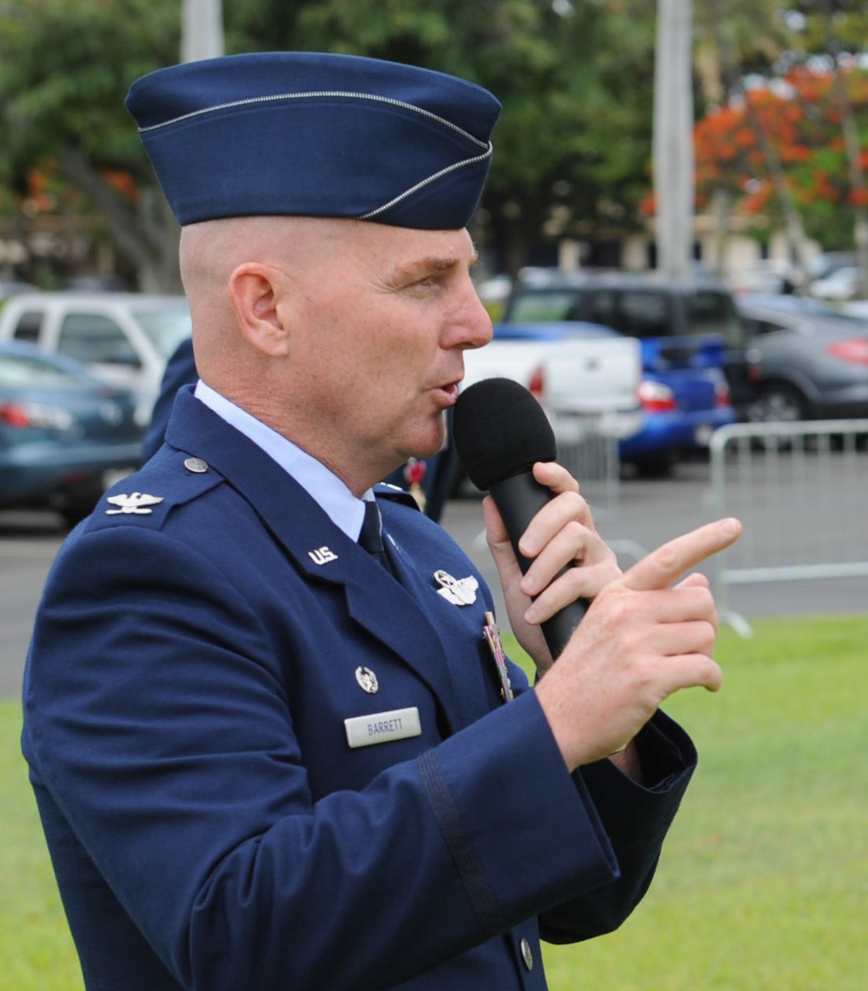 Col. Sam Barrett, 15th Wing commander, speaks to Airmen from the 15th Wing at a ceremony honoring Col. Joe Dague, 15th Wing vice commander, June 15 at Joint Base Pearl Harbor-Hickam, Hawaii. The Legion of Merit decoration is presented to officers and enlisted men of the Armed Forces of the United States and on nationals of other counties who have distinguished themselves by exceptionally meritorious conduct in the performance of outstanding services and achievements.