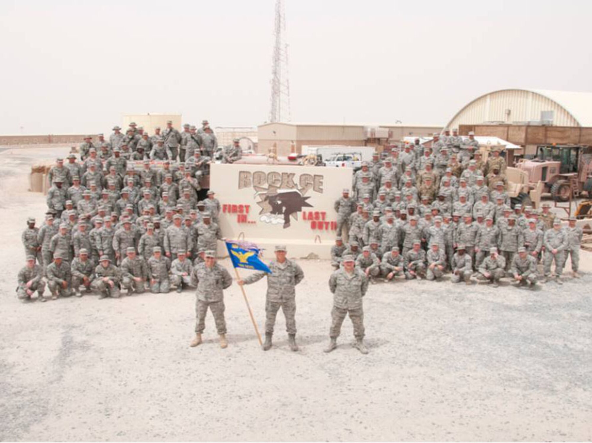 SOUTHWEST ASIA -- Air guardsmen from the 176 Civil Engineer Squadron stand along side the other members of the 386 Air Expeditionaly Wing in formation here May 5. The air guardsmen were assigned to the 386 Expeditionary Civil Engineer Squadron for a six-month tour.