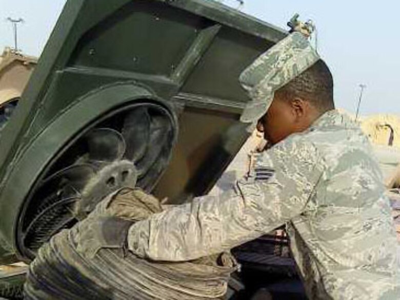 SOUTHWEST ASIA -- Senior Amn Dneko Mason, a heating, ventilation, and air conditioning technician from the 176 Civil Engineer Squadron, reconstructs worn equiptment here Feb. 20.Mason was assigned to the 386 Expeditionary Civil Engineer Squadron for a six-month tour. National Guard photo by Master Sgt. Chad Jennings.