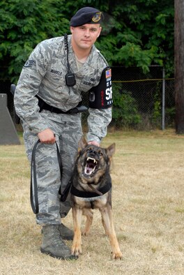 Staff Sgt. Richard Maricle, 51st Security Forces Squadron, and his Military Working Dog "Bakk." (U.S. Air Force photo/Tech. Sgt. Eric Petosky)