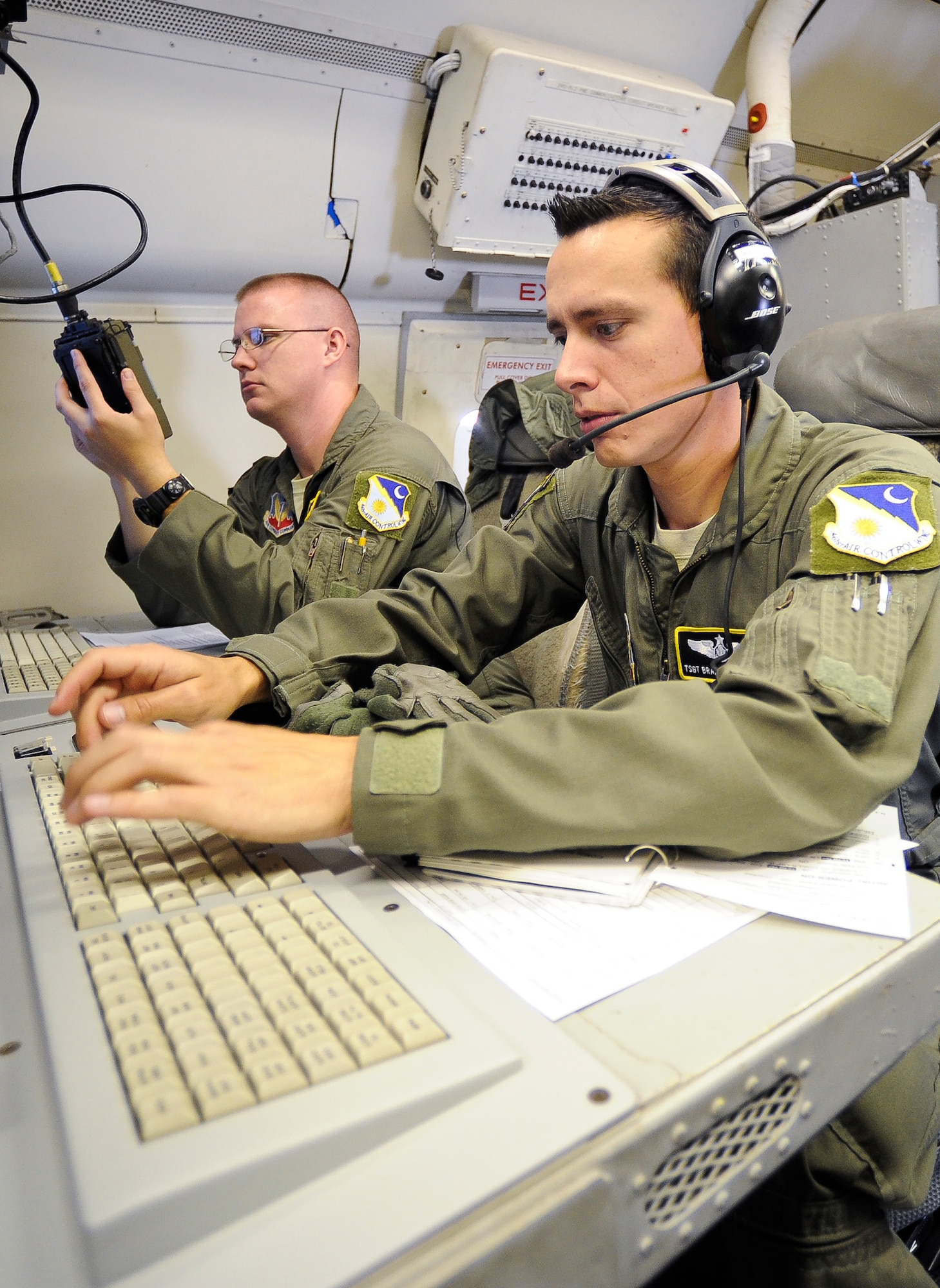 Aircrew members from the 461st Air Control Wing work at an operator work station during a mission aboard the E-8 Joint STARS, Robins Air Force Base, Ga., June 12, 2012.  The  mission was a part of the week long Iron Dagger 2012 exercise hosted by Team Joint STARS.
(National Guard photo by Master Sgt. Roger Parsons/Released)
