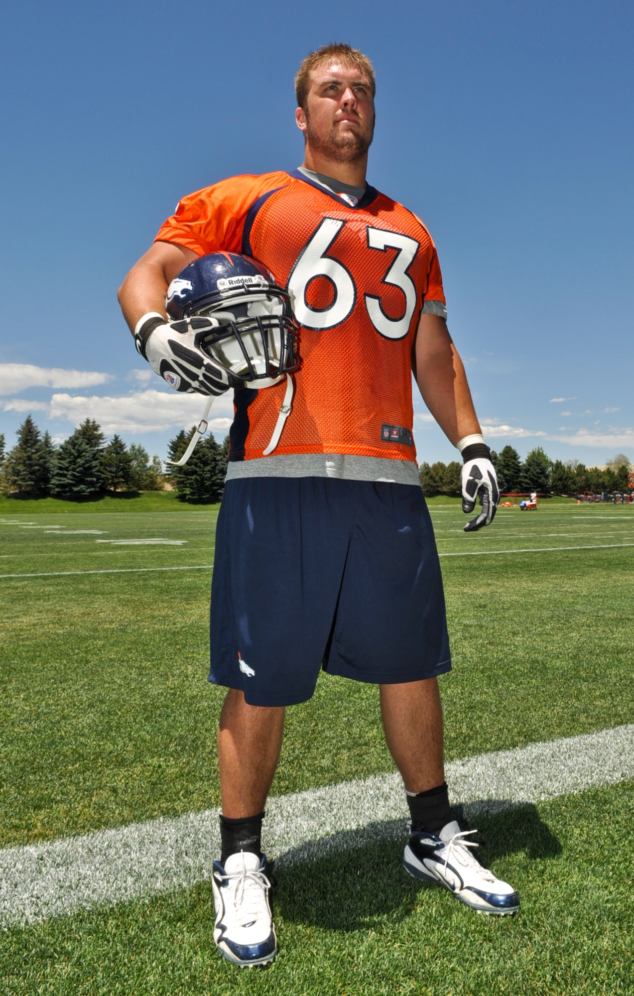 ENGLEWOOD, Colo. – Denver Broncos defensive end Benjamin Garland poses for a photo following mini-camp session June 13, 2012. Garland graduated with the Air Force Academy Class of 2010 and began his Air Force career as a strength and conditioning coach for the academy. He is currently assigned to the 140 Wing Public Affairs Office, Colorado Air National Guard. (U.S. Air Force photo by Senior Airman Christopher Gross)