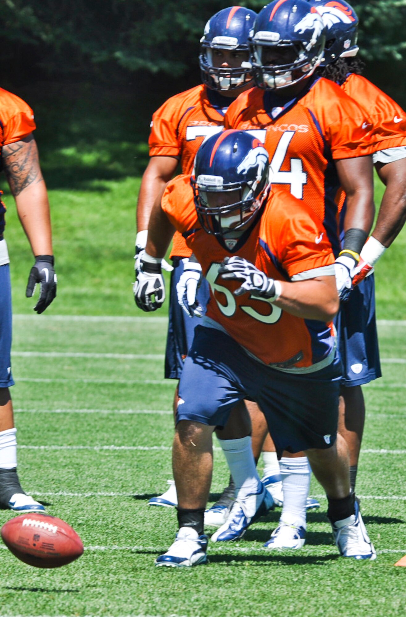 ENGLEWOOD, Colo. – Benjamin Garland participates in a drill during a Denver Bronco’s mini-camp session June 13, 2012. Garland, a defensive end for Broncos, signed a three-year contract with the team in 2010. (U.S. Air Force photo by Senior Airman Christopher Gross)