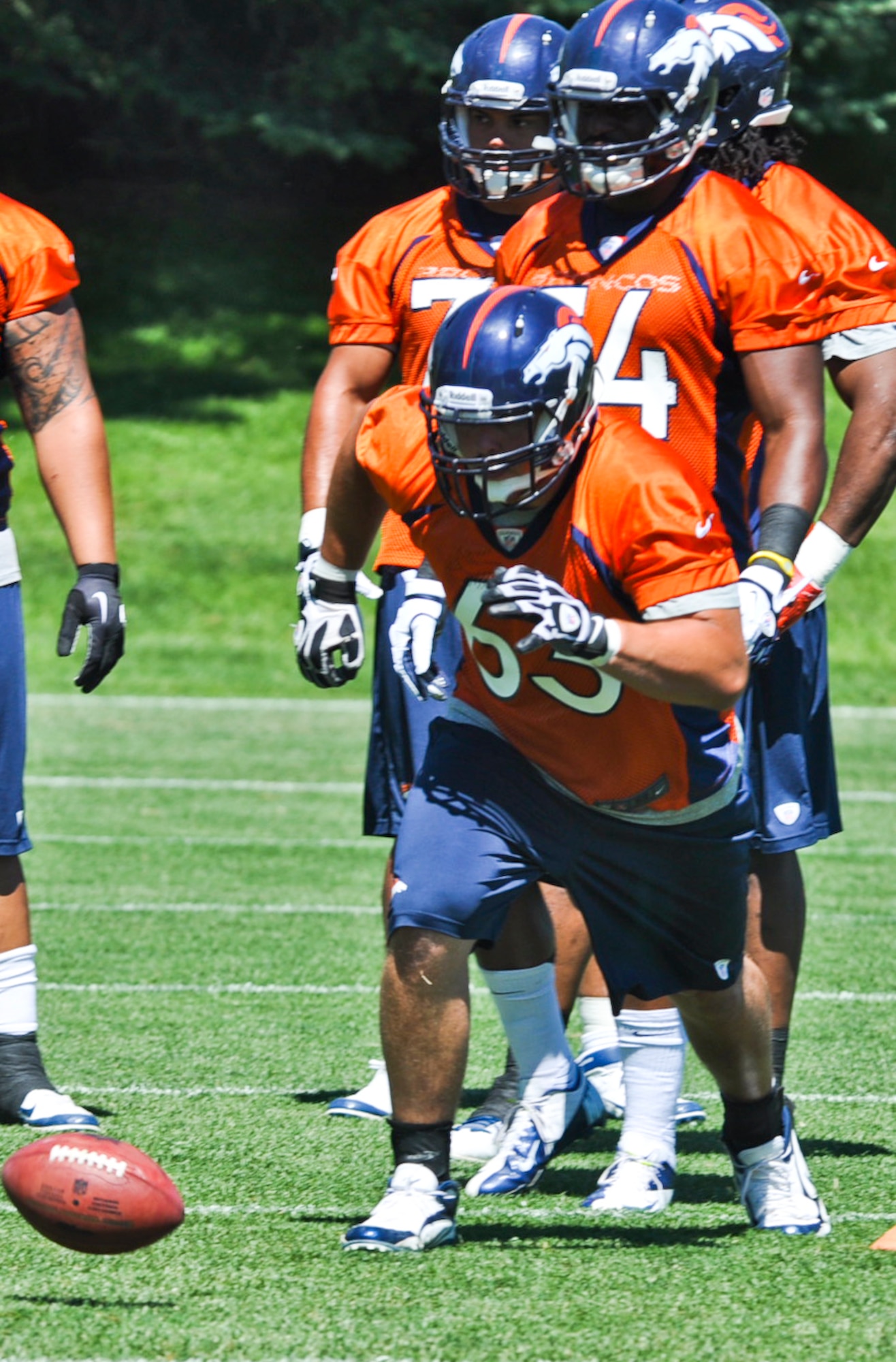 ENGLEWOOD, Colo. – Benjamin Garland participates in a drill during a Denver Bronco’s mini-camp session June 13, 2012. Garland, a defensive end for Broncos, signed a three-year contract with the team in 2010. (U.S. Air Force photo by Senior Airman Christopher Gross)