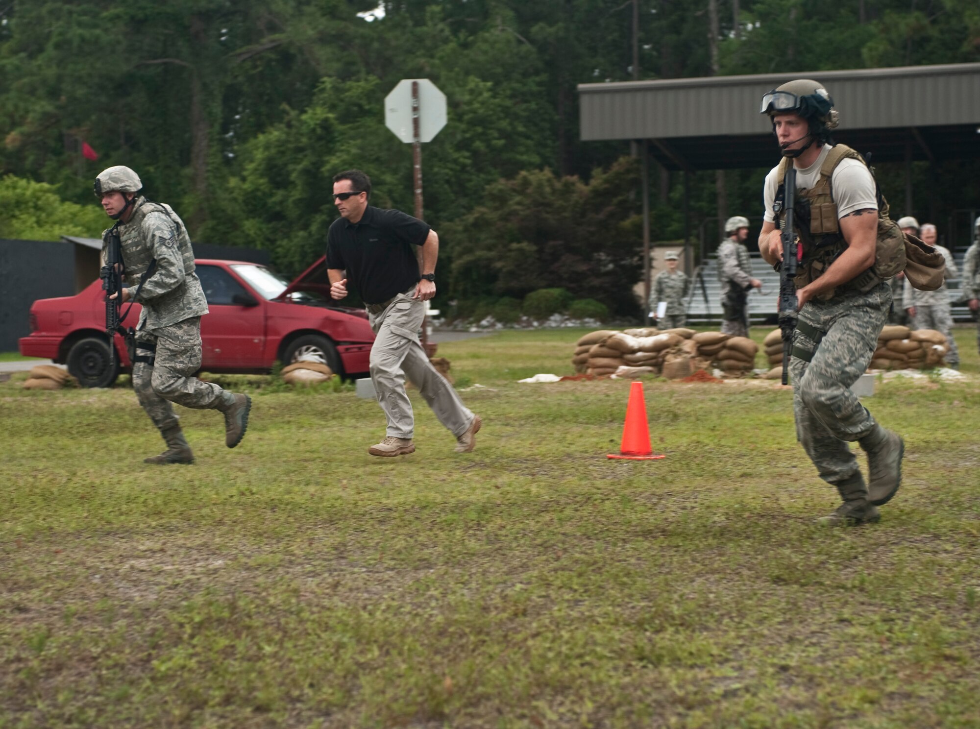 U.S. Air Force Airmen from the 1st Special Operations Security Forces Squadron participate in a live fire exercise at Hurlburt Field, Fla., June 8, 2012. The exercise was part of a five-day Multi-Assault Counter-Terrorism Action Capabilities course. (U.S. Air Force Photo/Airman 1st Class Hayden K. Hyatt) 