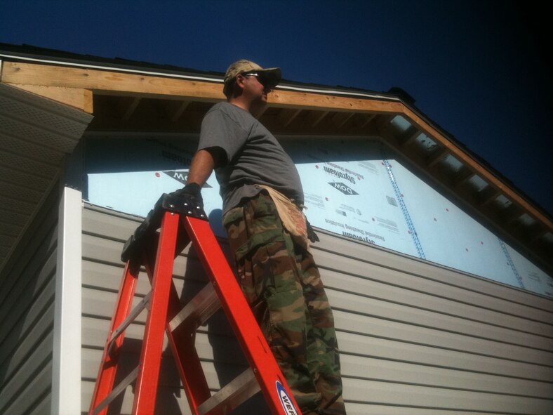 Tech. Sgt. Mike Joyner, 916th Force Support Squadron, supports Habitat for Humanity in June. (USAF courtesy photo 916FSS/SCOO)