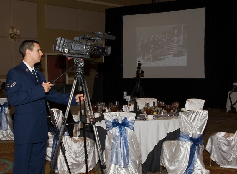 Airman 1st Class Antonio Gonzalez, 2nd Bomb Wing Public Affairs broadcast journalist, captures some b-roll footage before the start of the Air Force Global Strike Command 12 Outstanding Airmen of the Year in Shreveport, La., April 5. The Wing Public Affairs shop has four broadcast journalists who produce videos for the base website, Defense Video & Imagery Distribution System, YouTube  and other social media outlets to highlight the wing mission and members of Team Barksdale. (U.S. Air Force photo/Airman 1st Class Benjamin Gonsier)(RELEASED)
