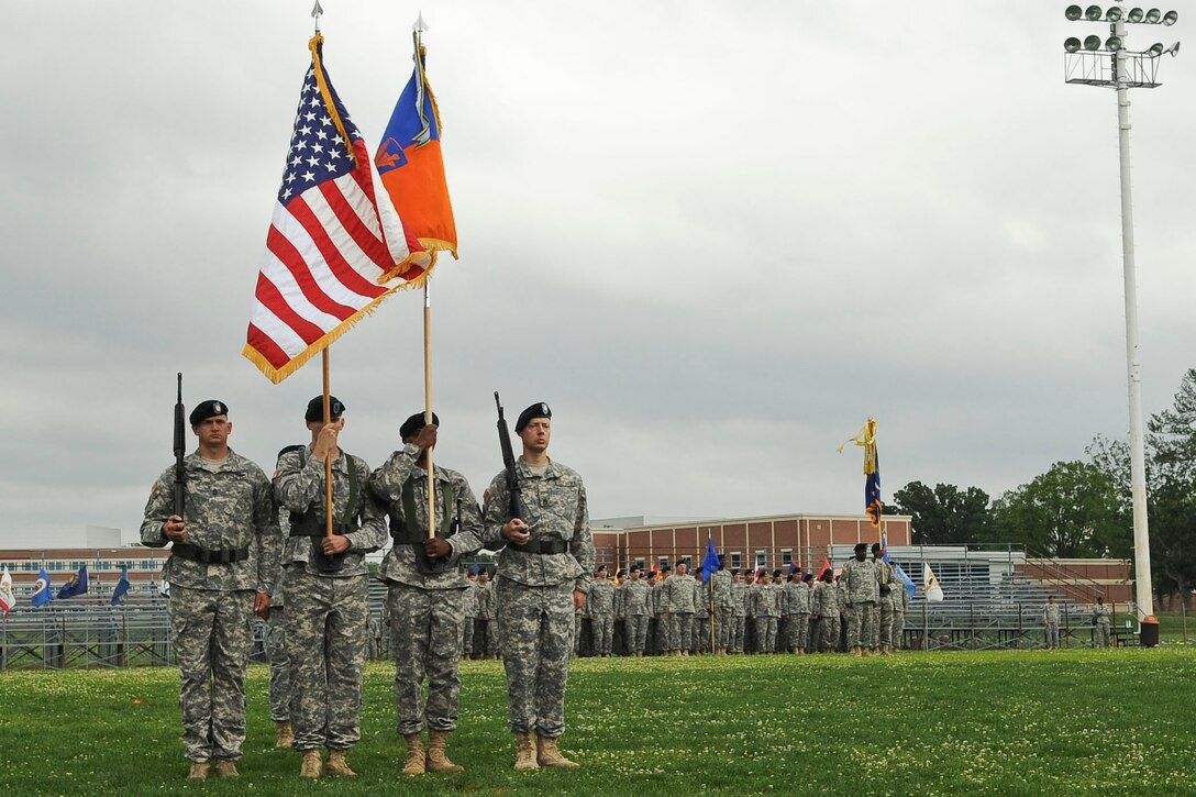 The 128th Aviation Brigade color guard presents the colors during the brigade's transfer of authority ceremony at Murphy Field Sports Complex at Ft. Eustis, Va., June 12, 2012. The ceremony welcomed Command Sgt. Maj. John J. Moore, who assumed responsibility of the unit from Command Sgt. Maj. Lloyd G. Morant. (U.S. Air Force photo by Senior Airman Wesley Farnsworth/Released)