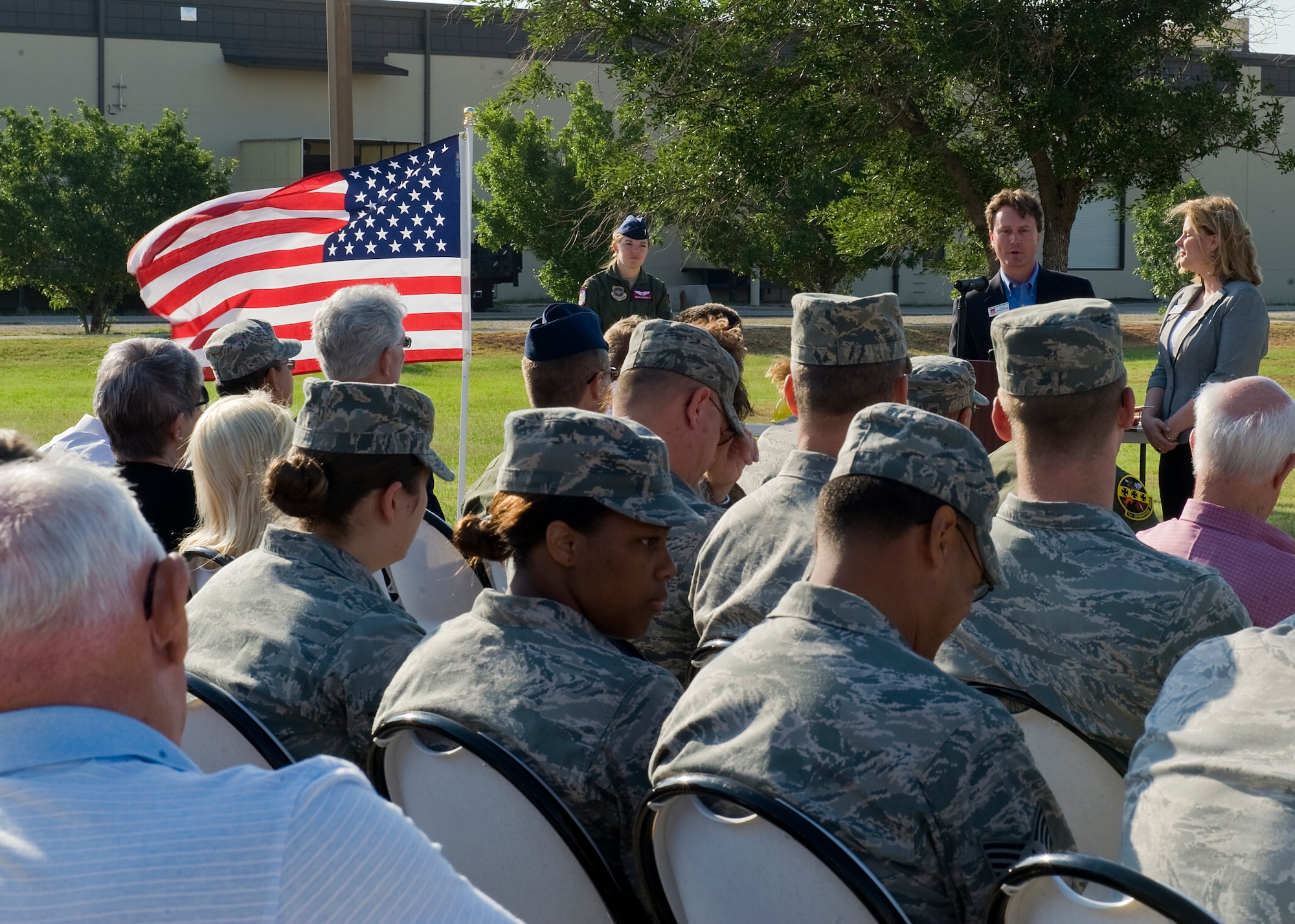 Gray Bridwell, 317th Airlift Group honorary commander, speaks to an audience about Dyess Air Force Base and its relationship with the city of Abilene during a ground-breaking ceremony June 14, 2012, at Dyess Air Force Base, Texas. The simulator will allow C-130J pilots to fly virtual missions ranging from airdrops to troop transportation without leaving the ground.  (U.S. Air Force photo by Airman 1st Class Jonathan Stefanko /Released)