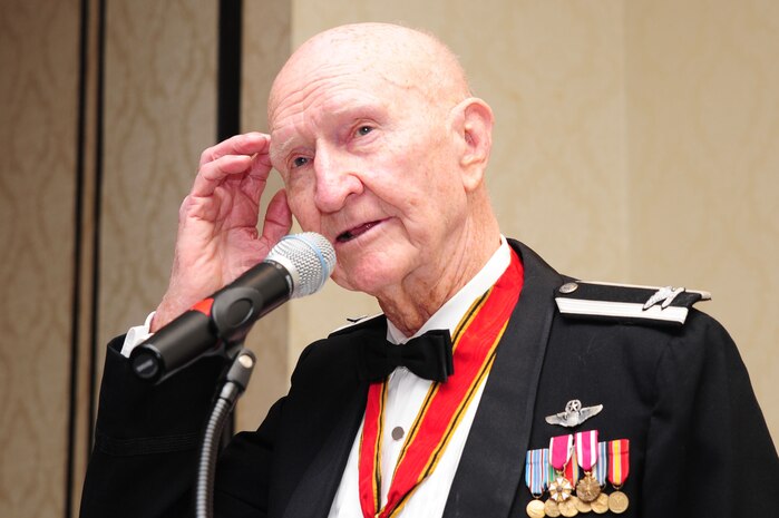 Retired Col. Gail Halvorsen, the famed "Candy Bomber," speaks at the Airmen Leadership School graduation at Joint Base Charleston, S.C., June 14, 2012.  Halvorsen was a command pilot in the United States Air Force. He is best known for piloting C-47s and C-54s during the Berlin Airlift from 1948-1949. Halvorsen dropped candy attached to parachutes to children below. His main goal was to raise the morale of the children during the time of uncertainty. (U.S. Air Force photo/ Airman 1st Class Chacarra Walker)
