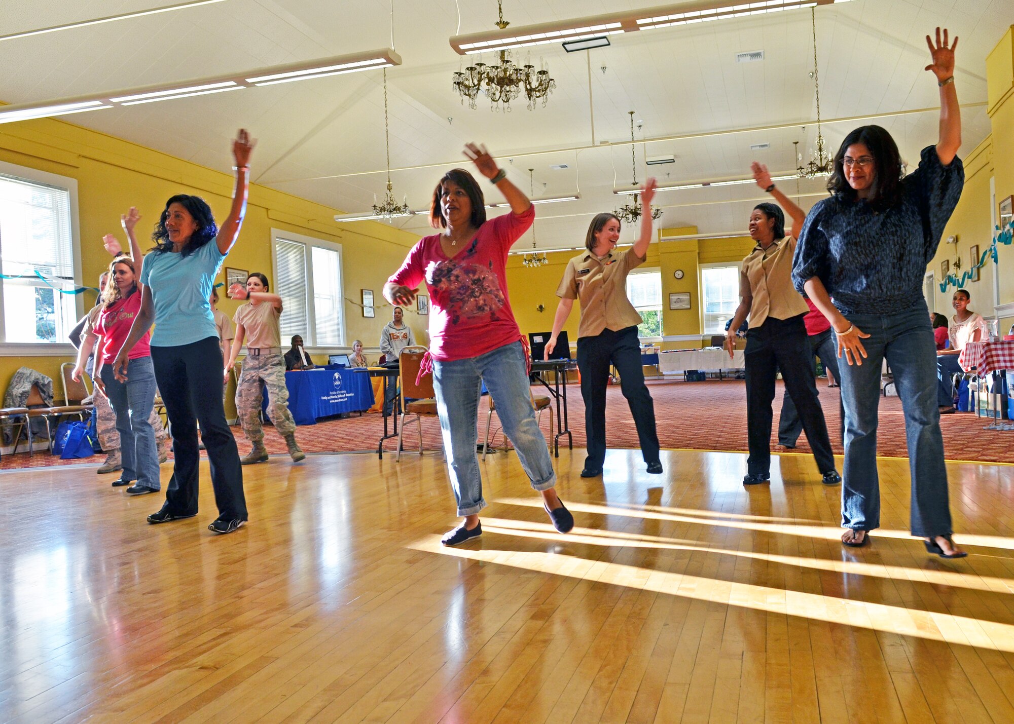 MONTEREY, Calif. -- Women participate in Zumba dancing during a Girls Night Out event held at the Presidio of Monterey Weckerling Center. The event provided Sexual Assault Prevention and Response program information to the attendees on how to keep themselves healthy, safe, and demonstrate how to prevent sexual assault and other issues women face on a daily basis. (U.S. Navy photo/Mass Communication Specialist 1st Class Nathan L. Guimont)
