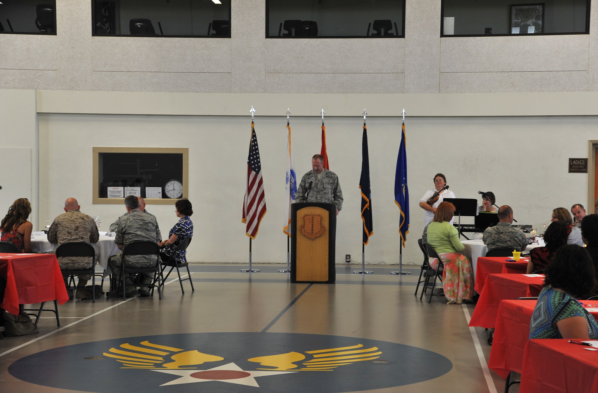 GOODFELLOW AIR FORCE BASE, Texas-- Captain Robert Bohnsack, 17th Training Wing Chaplain, welcomes Team Goodfellow service members and spouses to the Spouse Appreciation Luncheon June 13. The lunch was held to show how important of a roll spouses play in the military. (U.S. Air Force photo/Airman 1st Class Michael Smith)