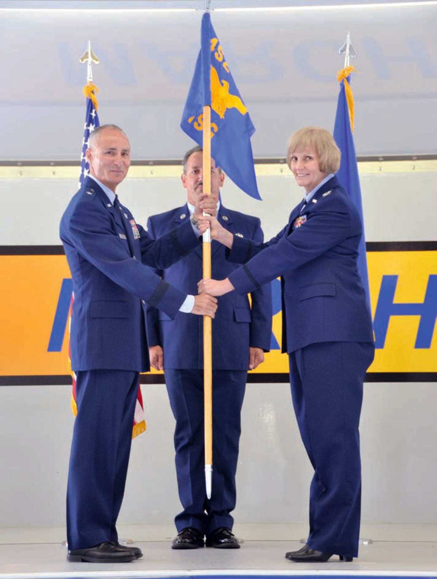 Col. Pamela LeBlanc, 452d Mission Support Group commander, relinquished command when passing the flag during a change of command ceremony at March Field, Sun., June 10, 2012, just prior to LeBlanc’s retirement. (U.S. Air Force photo by Master Sgt. Linda Welz)