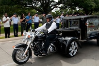The remains of Spc. Kedith L. Jacobs, 21, of Denver, Colo., arrived at Joint Base San Antonio-Randolph June 18. Jacobs died May 27 in Chak-E Wardak District, Afghanistan, when his unit was attacked by enemy forces.  He was assigned to Headquarters and Headquarters Company, 2nd Battalion, 5th Infantry Regiment, 3rd Brigade Combat Team, 1st Armored Division, Fort Bliss, Texas.  Funeral services will be held at Colonial Funeral Home in Universal City, Texas, followed by internment at JBSA-Fort Sam Houston Cemetery. People from JBSA-Randolph lined Harmon Drive for the memorial procession through Randolph. (U.S. Air Force photo by Melissa Peterson)