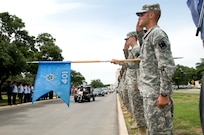 The remains of Spc. Kedith L. Jacobs, 21, of Denver, Colo., arrived at Joint Base San Antonio-Randolph June 18.  Jacobs died May 27 in Chak-E Wardak District, Afghanistan, when his unit was attacked by enemy forces.  He was assigned to Headquarters and Headquarters Company, 2nd Battalion, 5th Infantry Regiment, 3rd Brigade Combat Team, 1st Armored Division, Fort Bliss, Texas.  Funeral services will be held at Colonial Funeral Home in Universal City, Texas, followed by internment at JBSA-Fort Sam Houston Cemetery. People from JBSA-Randolph lined Harmon Drive for the memorial procession through Randolph. (U.S. Air Force photo by Melissa Peterson)