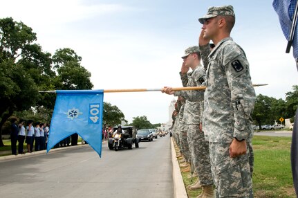 The remains of Spc. Kedith L. Jacobs, 21, of Denver, Colo., arrived at Joint Base San Antonio-Randolph June 18.  Jacobs died May 27 in Chak-E Wardak District, Afghanistan, when his unit was attacked by enemy forces.  He was assigned to Headquarters and Headquarters Company, 2nd Battalion, 5th Infantry Regiment, 3rd Brigade Combat Team, 1st Armored Division, Fort Bliss, Texas.  Funeral services will be held at Colonial Funeral Home in Universal City, Texas, followed by internment at JBSA-Fort Sam Houston Cemetery. People from JBSA-Randolph lined Harmon Drive for the memorial procession through Randolph. (U.S. Air Force photo by Melissa Peterson)