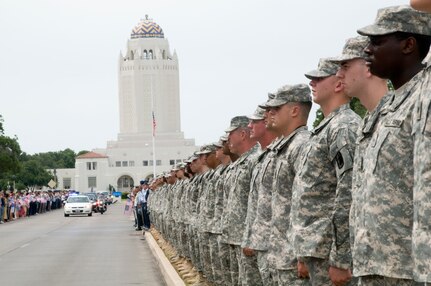 The remains of Spc. Kedith L. Jacobs, 21, of Denver, Colo., arrived at Joint Base San Antonio-Randolph June 18.  Jacobs died May 27 in Chak-E Wardak District, Afghanistan, when his unit was attacked by enemy forces.  He was assigned to Headquarters and Headquarters Company, 2nd Battalion, 5th Infantry Regiment, 3rd Brigade Combat Team, 1st Armored Division, Fort Bliss, Texas.  Funeral services will be held at Colonial Funeral Home in Universal City, Texas, followed by internment at JBSA-Fort Sam Houston Cemetery. People from JBSA-Randolph lined Harmon Drive for the memorial procession through Randolph. (U.S. Air Force photo by Melissa Peterson)