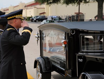 The remains of Spc. Kedith L. Jacobs, 21, of Denver, Colo., arrived at Joint Base San Antonio-Randolph June 18.  Specialist Jacobs died May 27 in Chak-E Wardak District, Afghanistan, when his unit was attacked by enemy forces.  He was assigned to Headquarters and Headquarters Company, 2nd Battalion, 5th Infantry Regiment, 3rd Brigade Combat Team, 1st Armored Division, Fort Bliss, Texas.  Funeral services will be held at Colonial Funeral Home in Universal City, Texas, followed by internment at Fort Sam Houston Cemetery. People from JBSA-Randolph lined Harmon Drive for the memorial procession through Randolph.

The remains of Spc. Kedith L. Jacobs, 21, of Denver, Colo., arrived at Joint Base San Antonio-Randolph June 18.  Specialist Jacobs died May 27 in Chak-E Wardak District, Afghanistan, when his unit was attacked by enemy forces.  He was assigned to Headquarters and Headquarters Company, 2nd Battalion, 5th Infantry Regiment, 3rd Brigade Combat Team, 1st Armored Division, Fort Bliss, Texas.  Funeral services will be held at Colonial Funeral Home in Universal City, Texas, followed by internment at Fort Sam Houston Cemetery. People from JBSA-Randolph lined Harmon Drive for the memorial procession through Randolph. (U.S. Air force Photo by Don Lindsey)

