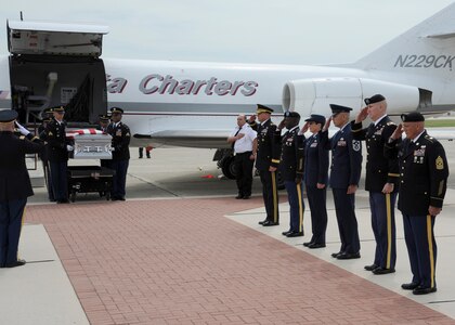 The remains of Spc. Kedith L. Jacobs, 21, of Denver, Colo., arrived at Joint Base San Antonio-Randolph June 18.  Jacobs died May 27 in Chak-E Wardak District, Afghanistan, when his unit was attacked by enemy forces.  He was assigned to Headquarters and Headquarters Company, 2nd Battalion, 5th Infantry Regiment, 3rd Brigade Combat Team, 1st Armored Division, Fort Bliss, Texas.  Funeral services will be held at Colonial Funeral Home in Universal City, Texas, followed by internment at JBSA-Fort Sam Houston Cemetery. People from JBSA-Randolph lined Harmon Drive for the memorial procession through Randolph. (U.S. Air Force Photo by Don Lindsey)


