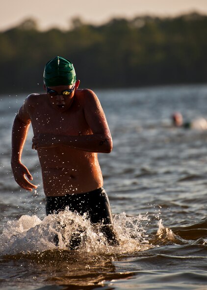 Joshua Wood is the first of his heat to exit the swim portion of the My-First-Tri competition June 16 at Eglin Air Force Base, Fla.  More than 140 people competed in the 13th annual base triathlon.  (U.S. Air Force photo/Samuel King Jr.)