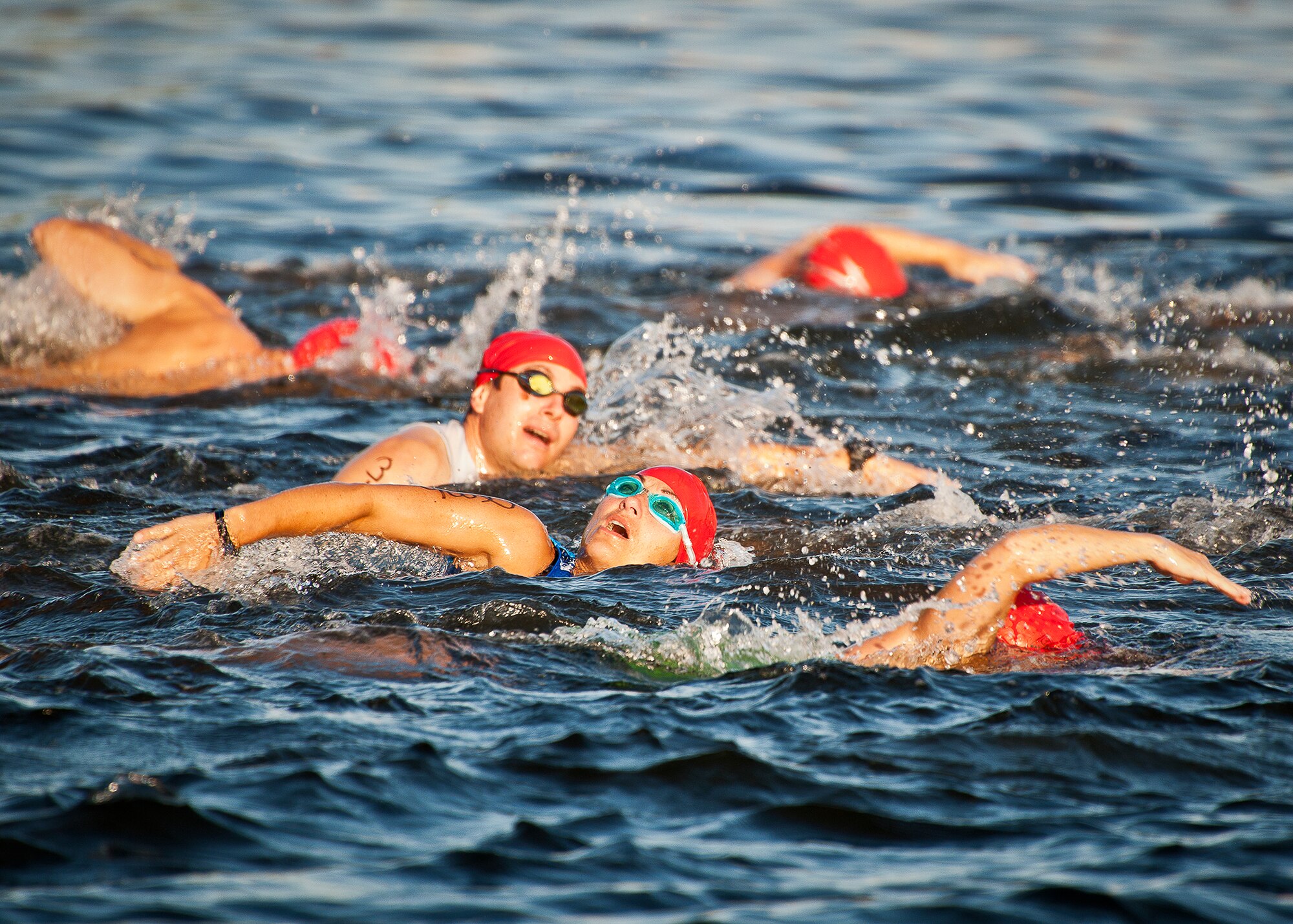 A female participant comes up for air during the first leg of the My-First-Tri competition June 16 at Eglin Air Force Base, Fla.  More than 140 people competed in the 13th annual base triathlon.  (U.S. Air Force photo/Samuel King Jr.)