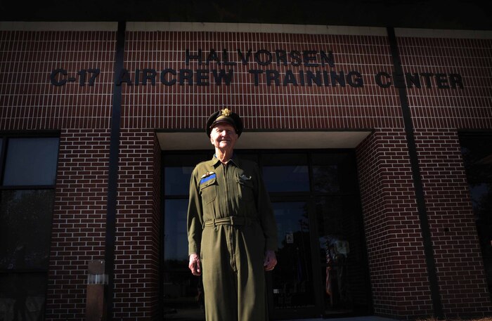 Retired Col. Gail Halvorsen, the famed "Candy Bomber", stands in front of the C-17 Aircrew Training Center moments after the C-17 Aircrew Training Center was dedicated in honor of him at Joint Base Charleston, S.C. June 15, 2012 to recognize him as one of the finest mobility legends. Halvorsen was a command pilot in the United States Air Force. He is best known for piloting C-47s and C-54s during the Berlin Airlift from 1948-1949. Halvorsen dropped candy attached to parachutes to children below. His main goal was to raise the morale of the children during the time of uncertainty. (U.S. Air Force photo/Airman 1st Class Ashlee Galloway)
