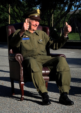 Retired Col. Gail Halvorsen, the famed "Candy Bomber", sits in front of the C-17 Aircrew Training Center moments before the C-17 Aircrew Training Center was dedicated in honor of him at Joint Base Charleston, S.C. June 15, 2012 to recognize him as one of the finest mobility legends. Halvorsen was a command pilot in the United States Air Force. He is best known for piloting C-47s and C-54s during the Berlin Airlift from 1948-1949. Halvorsen dropped candy attached to parachutes to children below. His main goal was to raise the morale of the children during the time of uncertainty. (U.S. Air Force photo/Airman 1st Class Ashlee Galloway)



