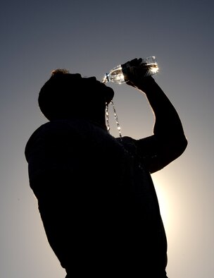 Drink at least one-half liter of water per hour to stay hydrated and prevent heat-related injuries. (U.S. Air Force photo/Tech. Sgt. Arian Nead)