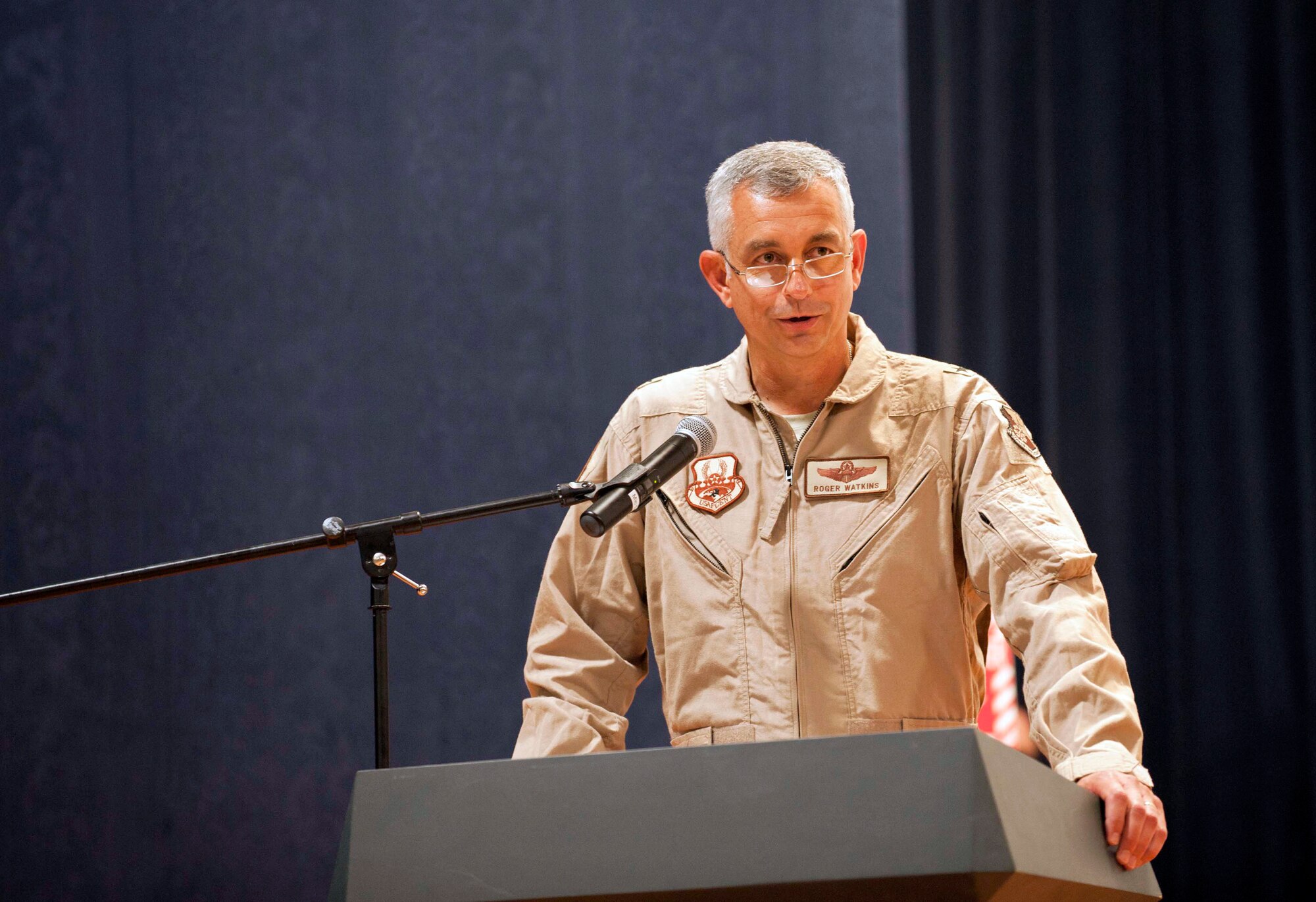 U.S. Air Force Brig. Gen. Roger Watkins, 379th Air Expeditionary Wing commander, gives his assumption of command speech during the 379th Air Expeditionary Wing change of command ceremony, June 14, 2012, Southwest Asia. Prior to his assignment, Watkins was the commander of the Jeanne M. Holm Center for Officer Accessions and Citizen Development, Maxwell Air Force Base, Ala. (U.S. Air Force photo/Staff Sgt. Sheila deVera)
