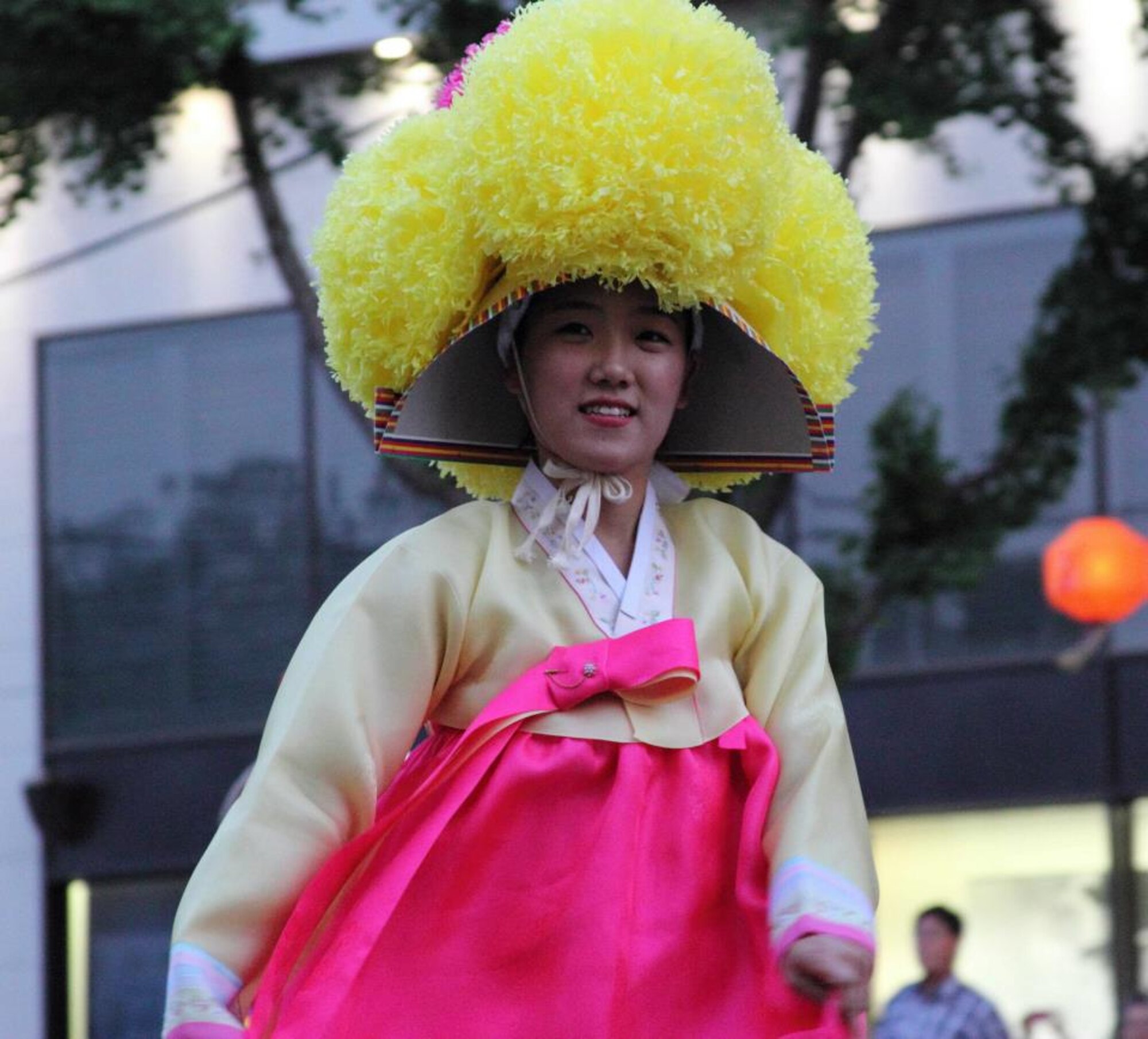 A Korean lady dressed in traditional bright-colored clothing participates in the Lantern Parade, May 19, 2012, in downtown Seoul, Republic of Korea. The festival is held annually the weekend closest to Buddha’s birthday. (U.S. Air Force photo/Staff Sgt. Brice Gaston)