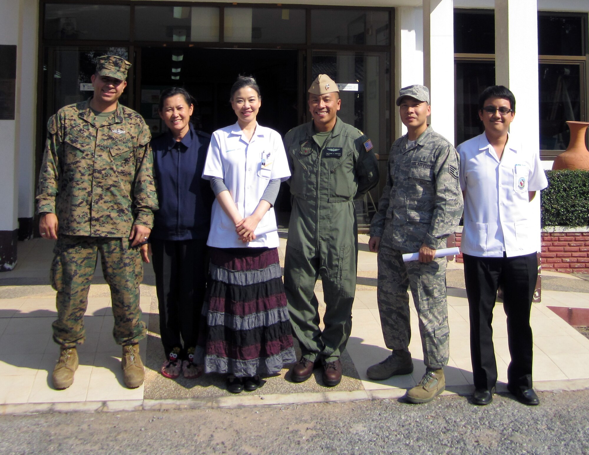 (Second from right) Tech. Sgt. Ireneo Alfaro, 18th Aerospace Medicine Squadron NCO in charge of community health element, on Kadena Air Base, Japan, poses for a group photo with coworkers during Operation Cobra Gold in Thailand. (Courtesy photo)
