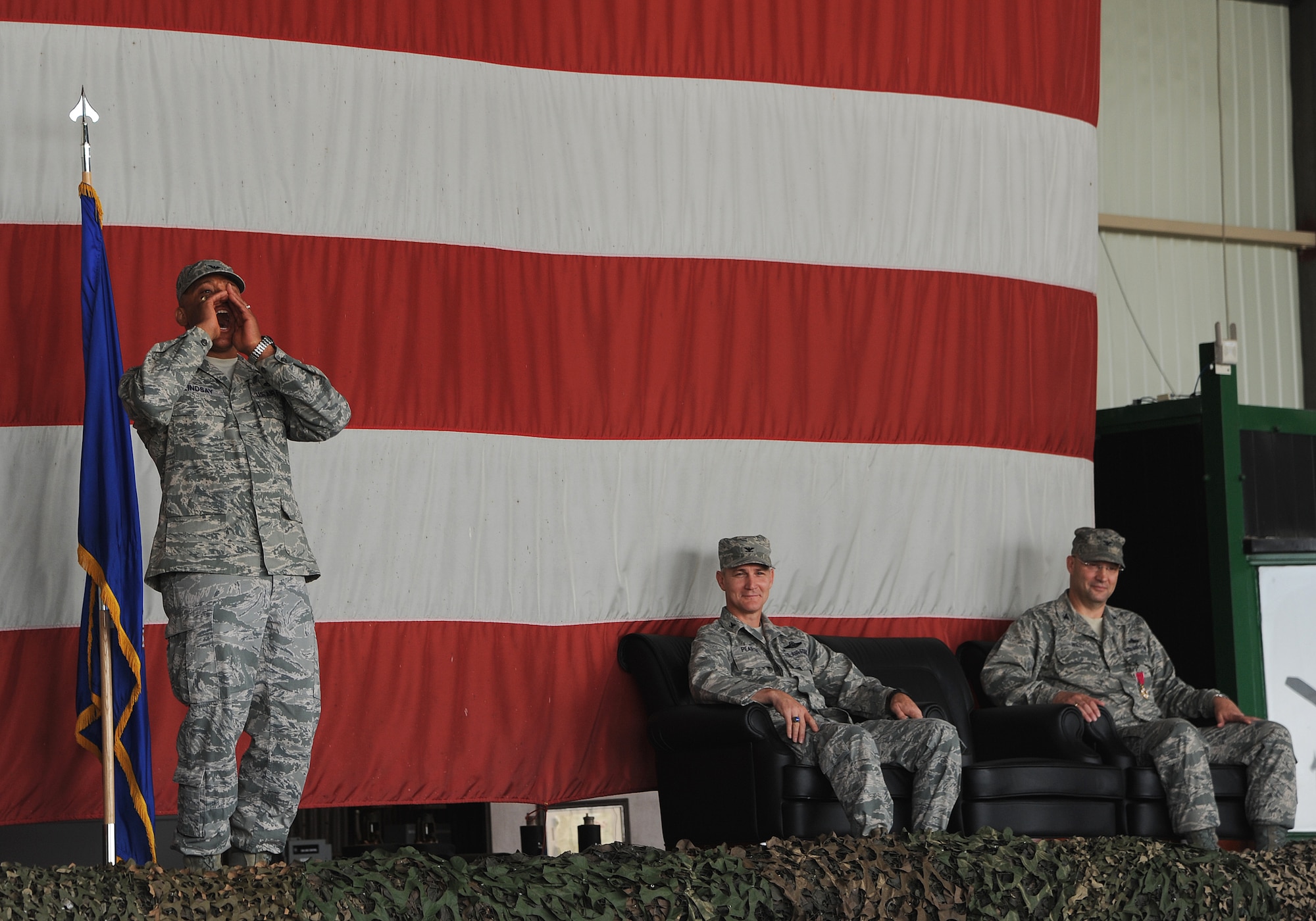 Col. Ray Lindsay, 8th Maintenance Group commander, shouts out his new unit’s motto during the change of command ceremony at Kunsan Air Base, Republic of Korea, June 15, 2012. The ceremony marks the official acceptance of Lindsay as the 8th MXG’s newest commander. (U.S. Air Force photo/Staff Sgt. Rasheen A. Douglas)