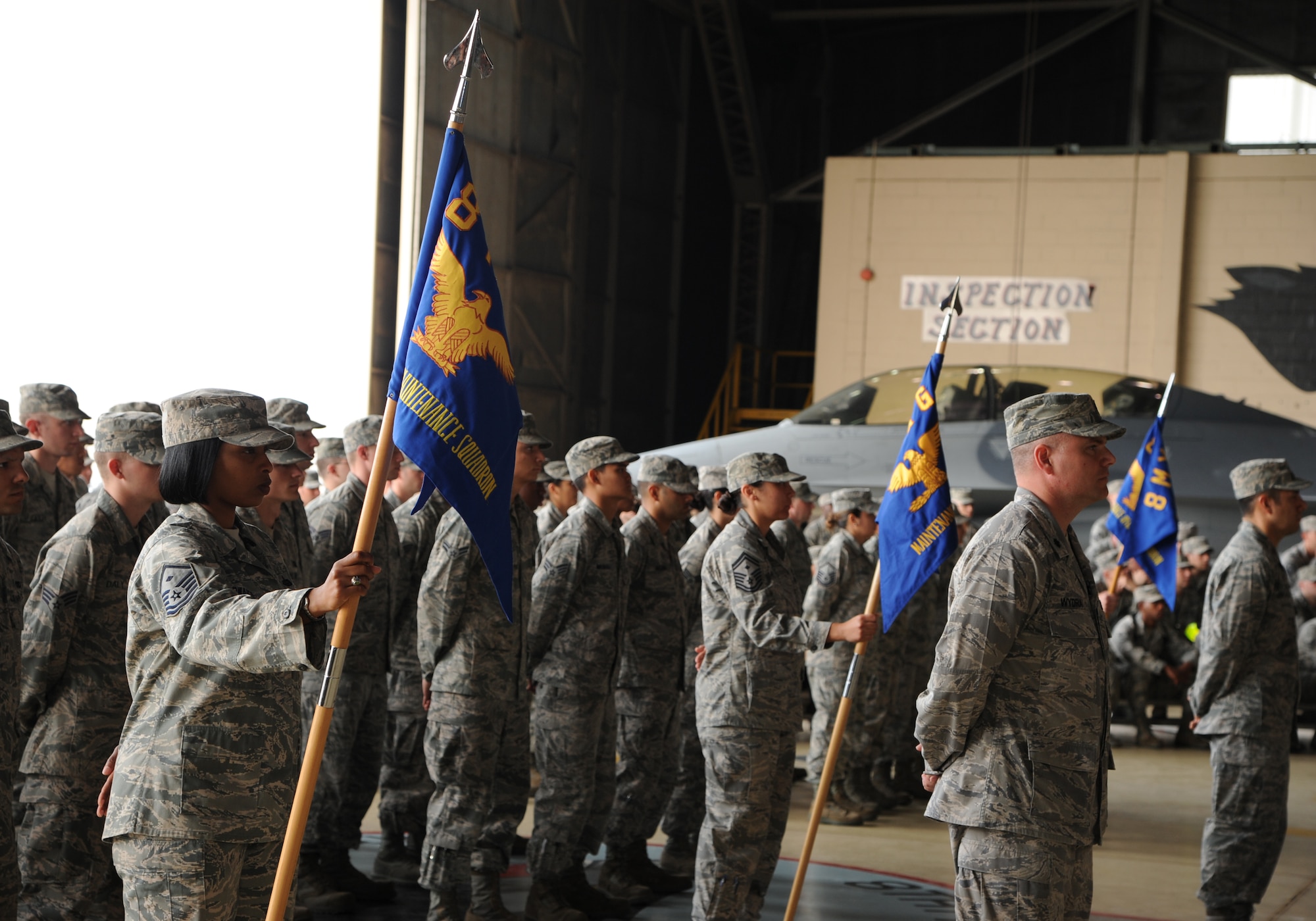 Airmen stand in formation during the 8th Maintenance Group change of command ceremony at Kunsan Air Base, Republic of Korea, June 15, 2012. The military ceremony gave Airmen the chance to see Col. Ray Lindsay assume command from Col. Dane P. West. Lindsay was last assigned to Wright-Patterson Air Force Base, Ohio. (U.S. Air Force photo/Staff Sgt. Rasheen A. Douglas)