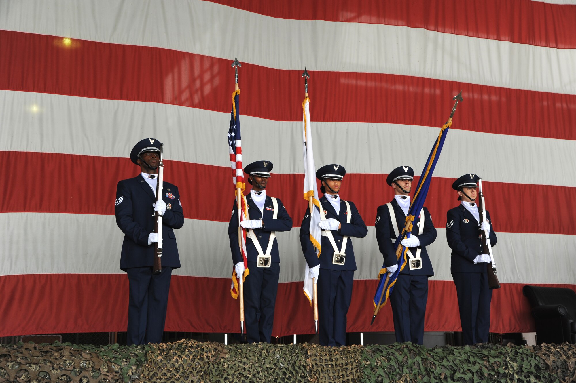 Members of the 8th Fighter Wing Honor Guard prepare to present the colors during the 8th Maintenance Group change of command ceremony on Kunsan Air Base, Republic of Korea, June 15, 2012. Col. Dane P. West handed over command to Col. Ray Lindsay, who is the wing’s newest “Phoenix.” (U.S. Air Force photo/Staff Sgt. Rasheen A. Douglas)