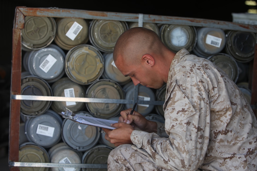 Cpl. Dwight Stephens, an ammunition technician with Supply Company, 1st Maintenance Battalion (-) (Reinforced), 1st Marine Logistics Group (Forward), counts a new shipment of ammunition at the Munitions Storage Area at Camp Leatherneck, Afghanistan, June 18. More than 6.6 million rounds are being moved from the Field Ammunition Supply Point to the new MSA.