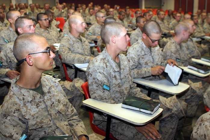Recruits from Company M listened to Lt. Jarrod Johnson, chaplain, 3rd Recruit Training Battalion talk about marriage as a first term Marine June 14 aboard Marine Corps Recruit Depot San Diego. This class was meant to help junior Marines understand the hardships invovled in a relationship while married and in the military. With some recruits already married before recruit training, they inquired information about benefits the Corps offers. Benefits such as the Single Marine Program were also discussed for single recruits that didn't plan to marry.