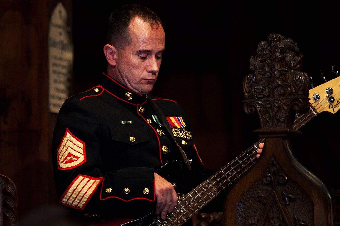 WELLINGTON, New Zealand -- Staff Sgt. Steven Harbison, musician with the U.S. Marine Corps Forces, Pacific Band, plays at a concert at Old St. Paul’s, Wellington here June 13. The concert was part of several events commemorating the 70th anniversary of U.S. Marines landing in Wellington. The performance was held in the church where Marines worshipped during their stay in Wellington. (U.S. Marine Corps photo by Cpl. Isis Ramirez/released)
