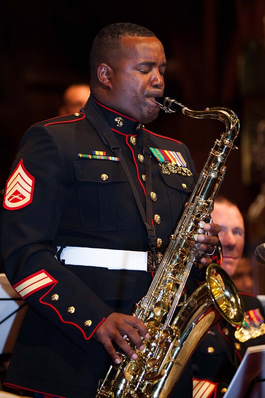 WELLINGTON, New Zealand – Staff Sgt. Jordan Dixon, musician with the U.S. Marine Corps Forces, Pacific Band plays during a concert at Old St. Paul’s, Wellington here June 13. The MarForPac Band and color guard are participating in events throughout New Zealand to commemorate the 70th anniversary of U.S. Marines arriving in Wellington during World War II. (U.S. Marine Corps photo by Cpl. Isis Ramirez/released)